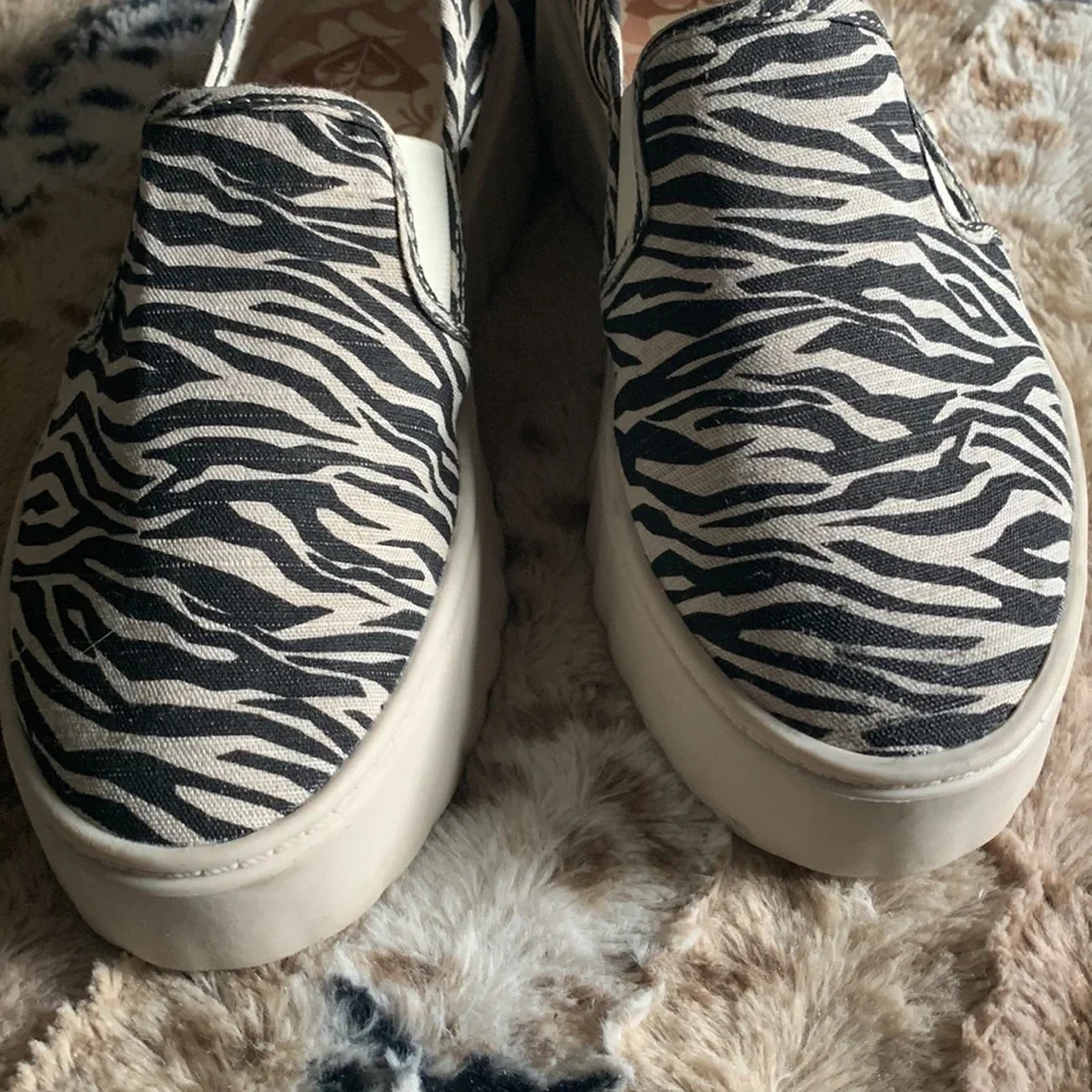 Roxy Zebra Print Platform Slip-On Sneakers in Black and Cream